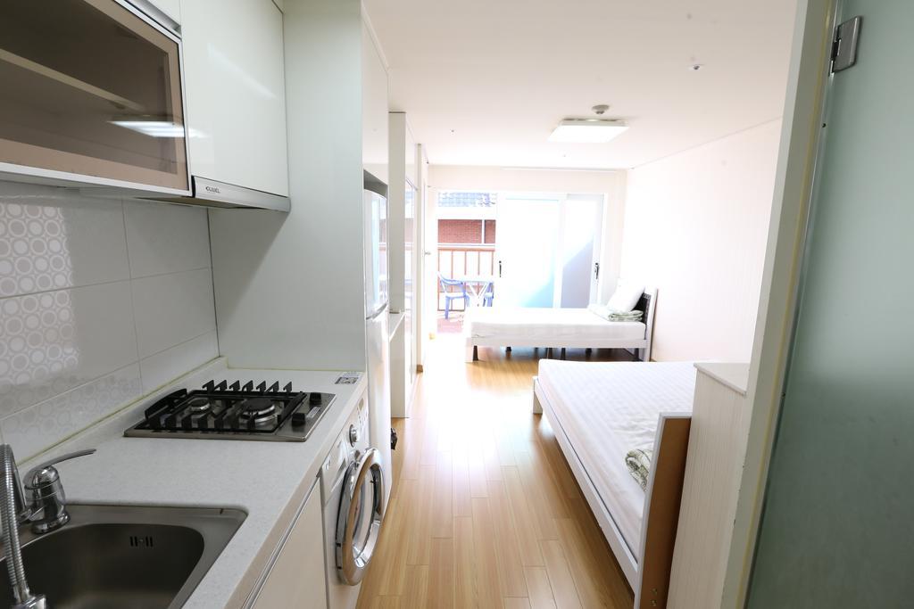 Phil House Albergue Guri Habitación foto