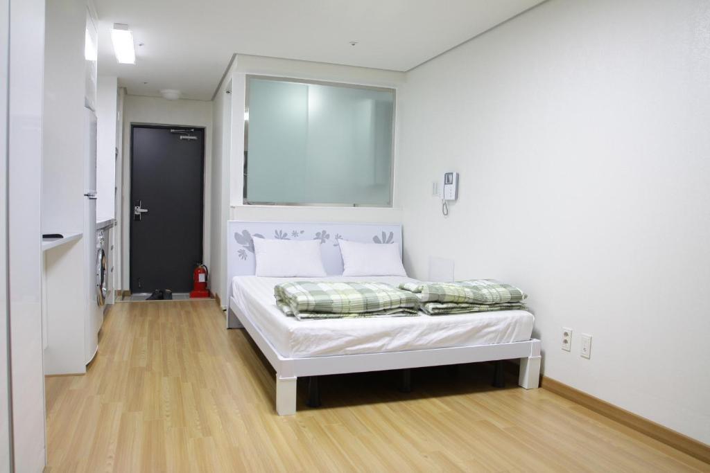 Phil House Albergue Guri Habitación foto